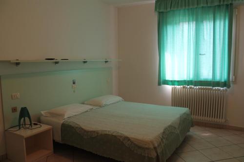 Posteľ alebo postele v izbe v ubytovaní Agriturismo Le Casette