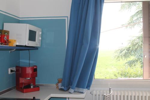 Kuchyň nebo kuchyňský kout v ubytování Agriturismo Le Casette