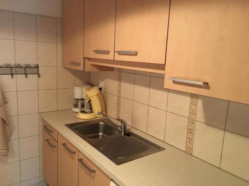 Virtuve vai virtuves zona naktsmītnē Appartement Les Gets, 4 pièces, 6 personnes - FR-1-671-53