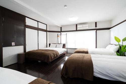 Katil atau katil-katil dalam bilik di APRO STAY Denenchofu Tamagawa