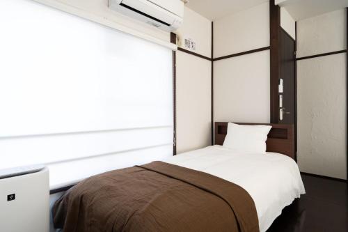 Katil atau katil-katil dalam bilik di APRO STAY Denenchofu Tamagawa