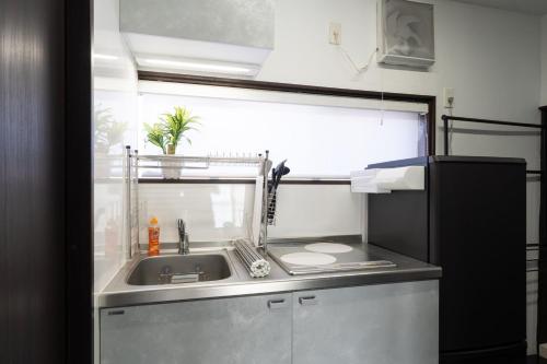Dapur atau dapur kecil di APRO STAY Denenchofu Tamagawa