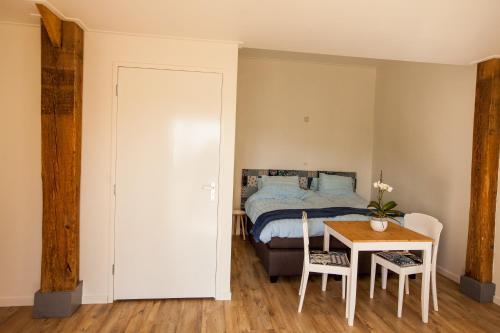 Postel nebo postele na pokoji v ubytování Bed And Breakfast Geertruidahoeve