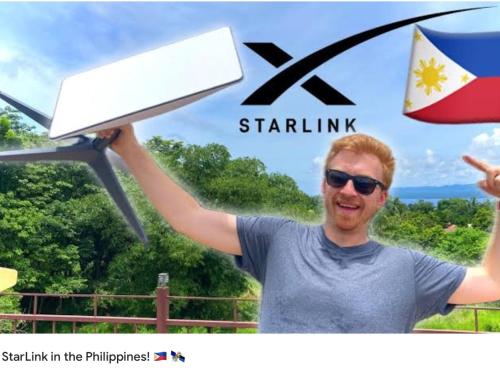 a man holding up a laptop in the philippines at BambooBeachVilla1 AC New OCEANFRONT POOL sunsetview garden kitchen SATELLITE STARLINK WI-FI in Dimiao