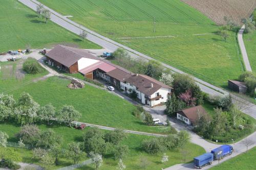 an aerial view of a house in a field at Ferienwohnungen Karle in Künzelsau