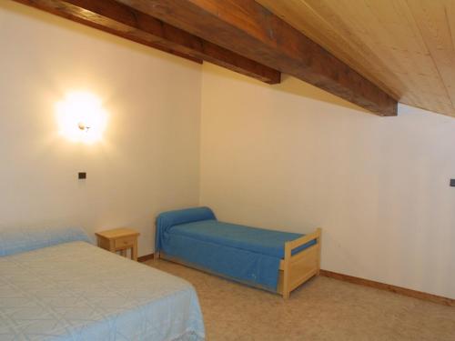 Кровать или кровати в номере Appartement Les Gets, 3 pièces, 8 personnes - FR-1-671-86