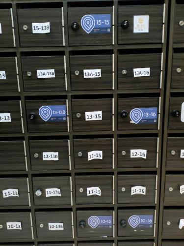 a row of lockers with numbers on them at D'Aqiela Homestay @ ITCC in Penampang
