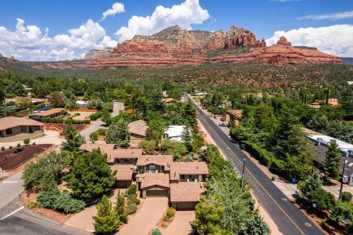 an aerial view of a town with mountains in the background at Uptown Sedona Gem: 3-Bed Townhome with Majestic Views and Central Location in Sedona