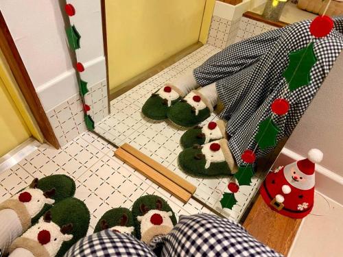a group of teddy bears on the floor in a kitchen at Onheim in Tongyeong