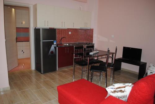 Η κουζίνα ή μικρή κουζίνα στο Kentrikon Suites