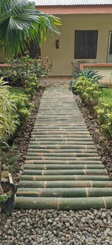 a set of stairs in front of a house at Marianita's cottages in Mambajao