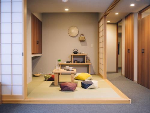 Гостиная зона в MIMARU SUITES Kyoto Shijo