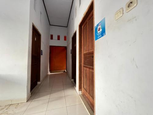 Фотография из галереи Hotel O Ziza Kost82 Syariah в городе Membura