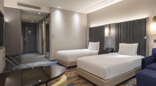 Ένα ή περισσότερα κρεβάτια σε δωμάτιο στο Hilton Istanbul Bakirkoy