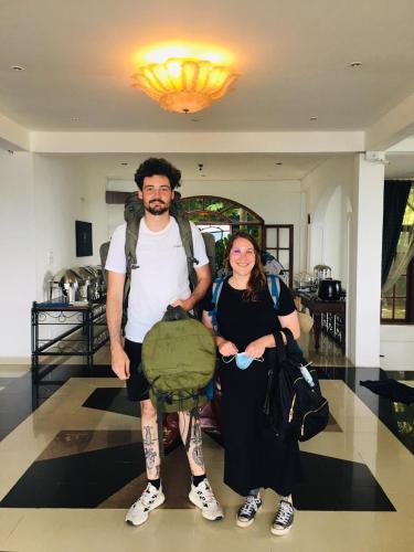 a man and a woman posing for a picture at Ceylon Breeze in Kandy