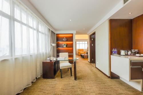 Η κουζίνα ή μικρή κουζίνα στο Zhengzhou Yuehai Hotel