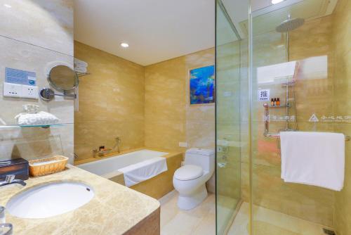 Ένα μπάνιο στο Zhengzhou Yuehai Hotel