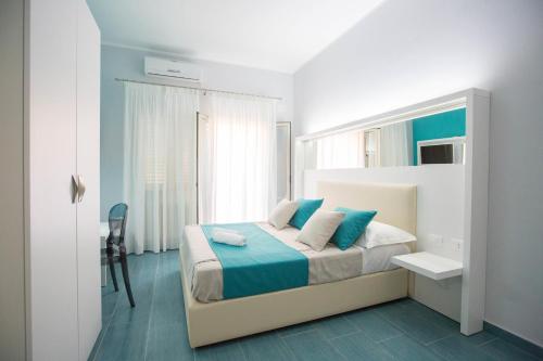 A bed or beds in a room at B&b Olas Del Mar