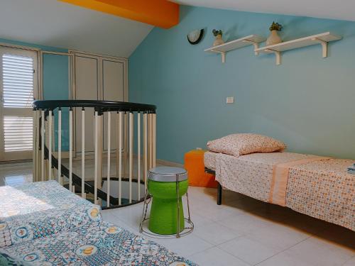 Postel nebo postele na pokoji v ubytování Mirone Apartment FRONTE MARE beachfront house