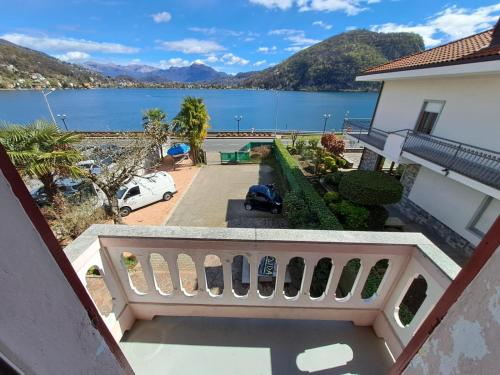 arial view of a house with a view of a lake at VILLA AIDA LAKE VIEW in Lavena Ponte Tresa