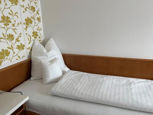 Postel nebo postele na pokoji v ubytování Hotel Jungbräu