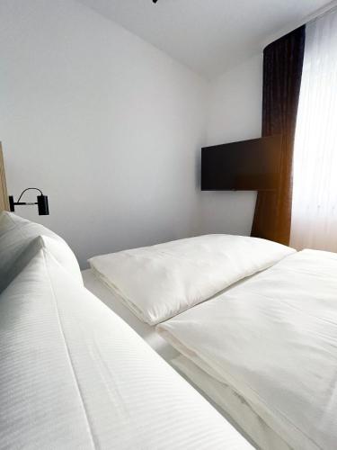 Katil atau katil-katil dalam bilik di HOLI City Apart Hotel Berlin