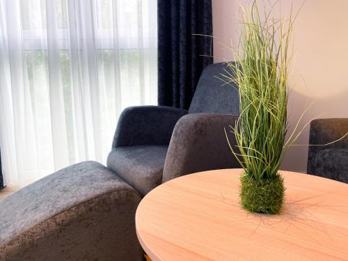 Ruang duduk di HOLI City Apart Hotel Berlin