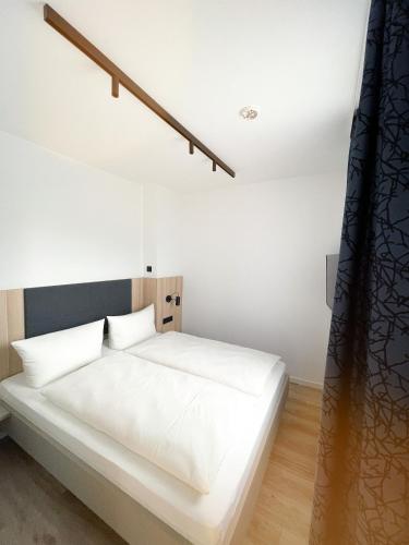 Katil atau katil-katil dalam bilik di HOLI City Apart Hotel Berlin
