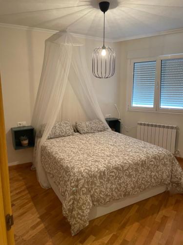 Postel nebo postele na pokoji v ubytování Apartamento vacacional foz
