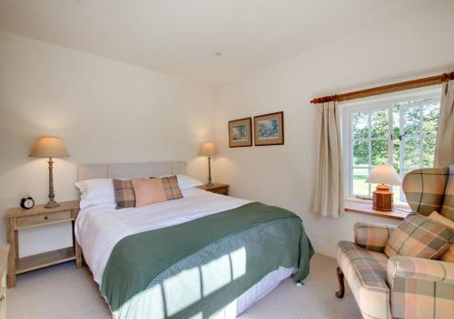 Postel nebo postele na pokoji v ubytování Coldwell Cottage
