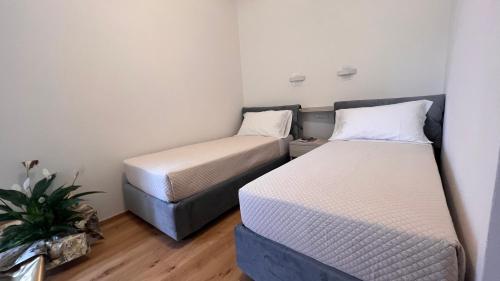 Ένα ή περισσότερα κρεβάτια σε δωμάτιο στο B&B Aurora