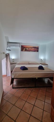 Ένα ή περισσότερα κρεβάτια σε δωμάτιο στο La casa del Professore