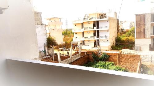 a view of a city from a building at SP Villa & Homestay - For Couples, Students, Faculties, Family in Phagwāra
