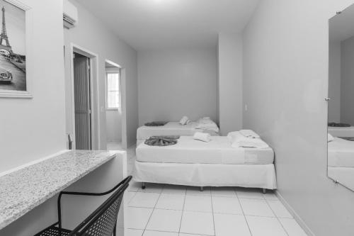 Een bed of bedden in een kamer bij Hotel Mares de Iracema
