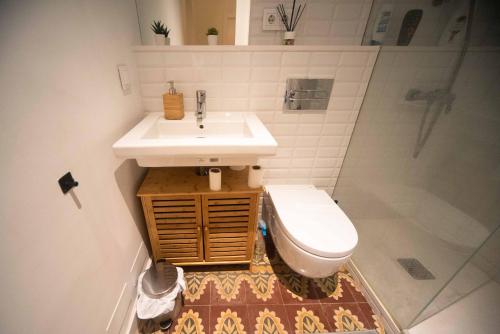 a bathroom with a sink and a toilet at Born Rooms - St Caterina in Barcelona