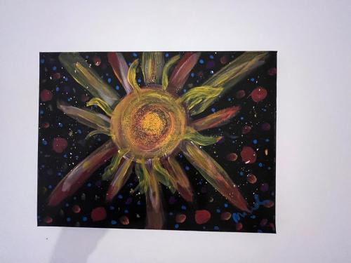 a painting of a flower on a white wall at Casa Morello in Zambrone