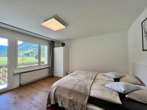 Ένα ή περισσότερα κρεβάτια σε δωμάτιο στο Mountain magic apartment for 6 Near Zermatt