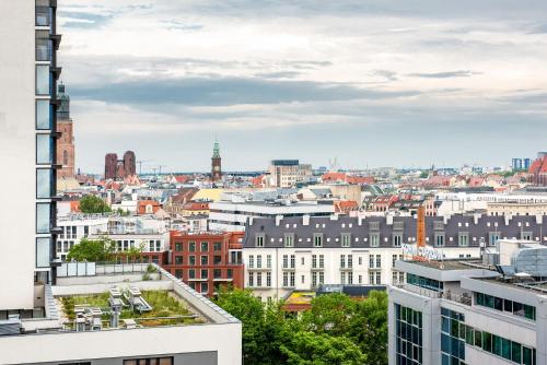 a view of a city skyline with buildings at Apartamenty City Tower od WroclawApartament-pl in Wrocław