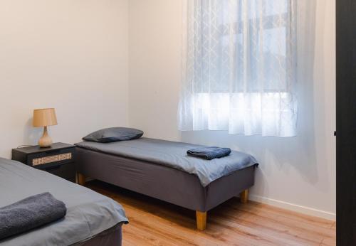 Ein Bett oder Betten in einem Zimmer der Unterkunft Posti Guesthouse