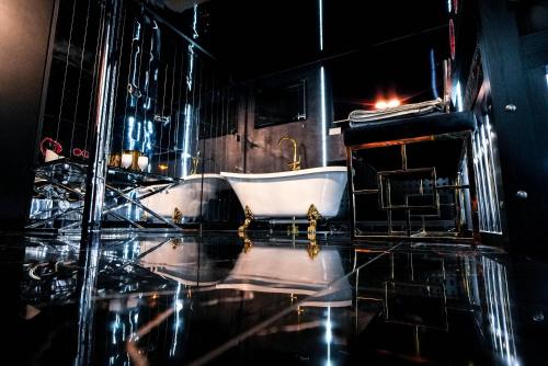 Ένα μπάνιο στο Grey Champagne Spa by Secret Apartament