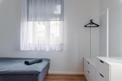 Ein Bett oder Betten in einem Zimmer der Unterkunft Posti Guesthouse