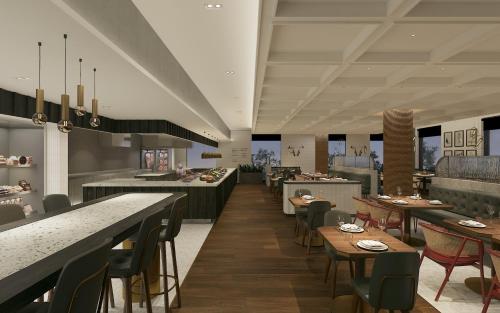 a restaurant with tables and chairs and a cafeteria at Holiday Inn & Suites Geelong by IHG in Geelong