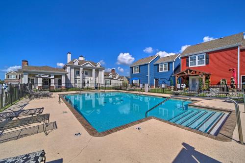 a swimming pool in front of a house at Pool and Lake Access Lovely Monkey Island Getaway in Afton