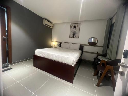 Un ou plusieurs lits dans un hébergement de l'établissement ĐÔNG NHƯ HOTEL