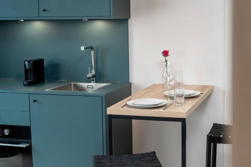 Η κουζίνα ή μικρή κουζίνα στο Gustav Appartements