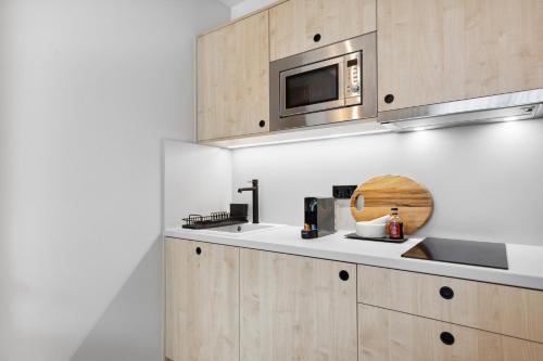 Una cocina o cocineta en Home and CoLiving Bonn I Aparthotel