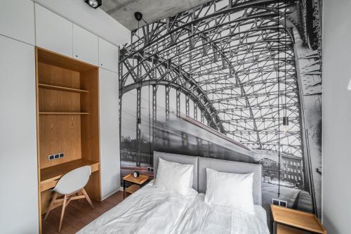 Tempat tidur dalam kamar di Zielona Polana Luxury Apartment
