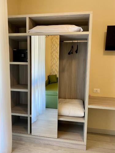 a room with a bunk bed in a room at Hotel Liu in Lido di Camaiore