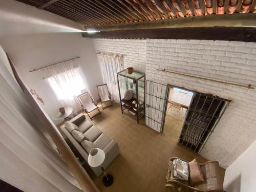 an overhead view of a living room with a couch and a fireplace at Casa Beira Mar Itamaracá in Itamaracá
