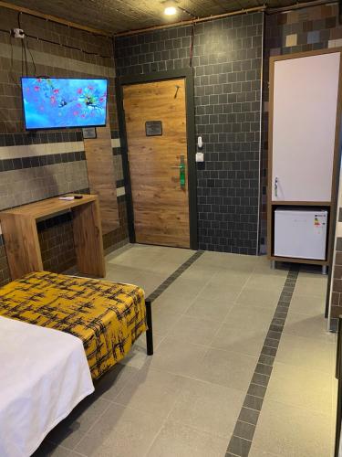 Letto o letti in una camera di M-ODA OTEL